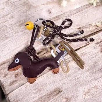 Porte-clés chien clochette design marron