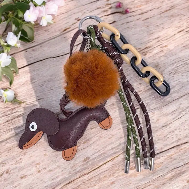 Grigri de sac chien avec pompon ÉLINE L’ATELIER