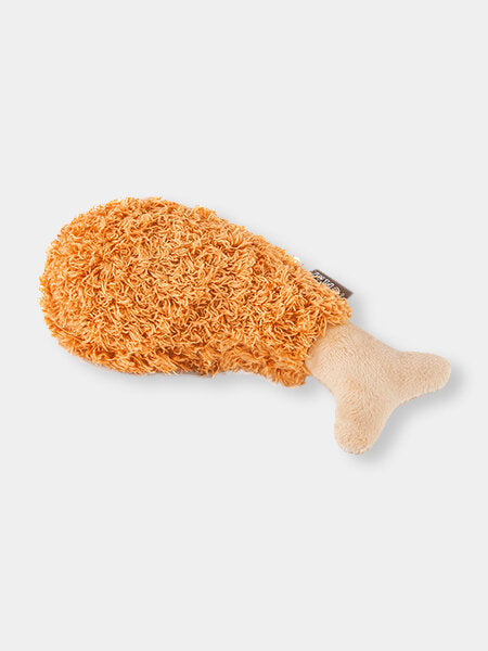 Découvrez notre incroyable peluche pour chien en forme de poulet frit chez DOG DELICAT